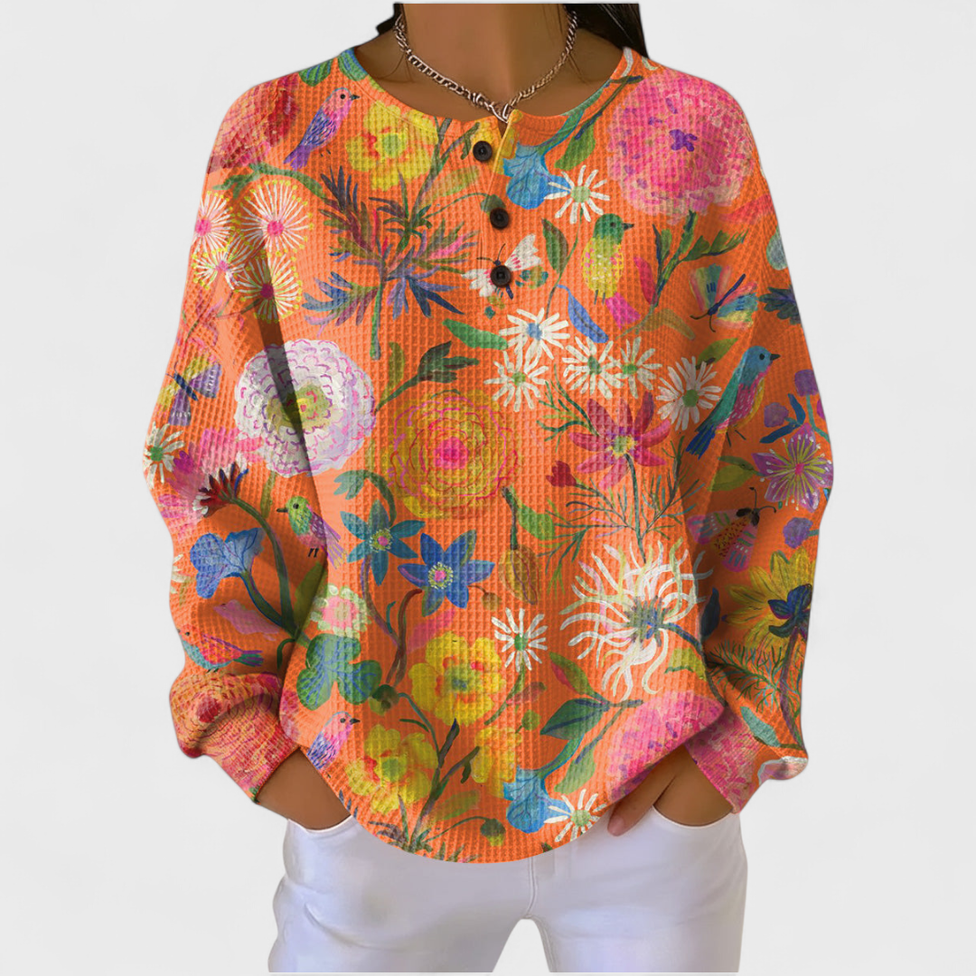 Paula | Jersey naranja con estampado floral multicolor