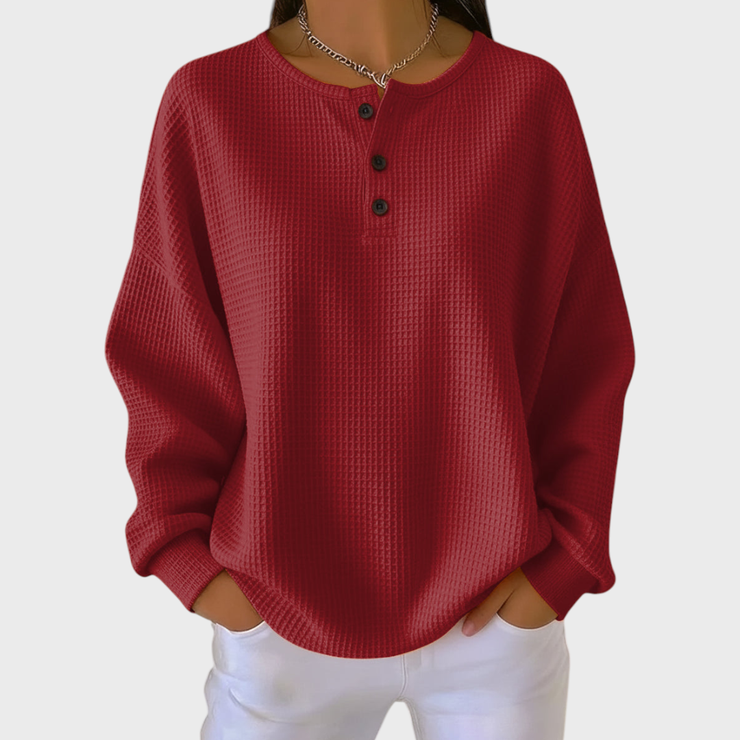 Helena | Jersey naranja de punto con textura suave