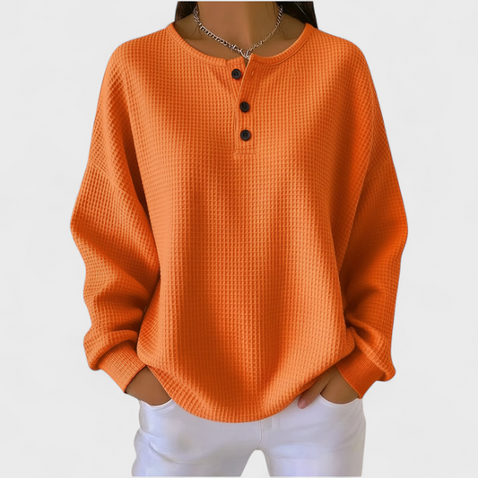 Helena | Jersey naranja de punto con textura suave